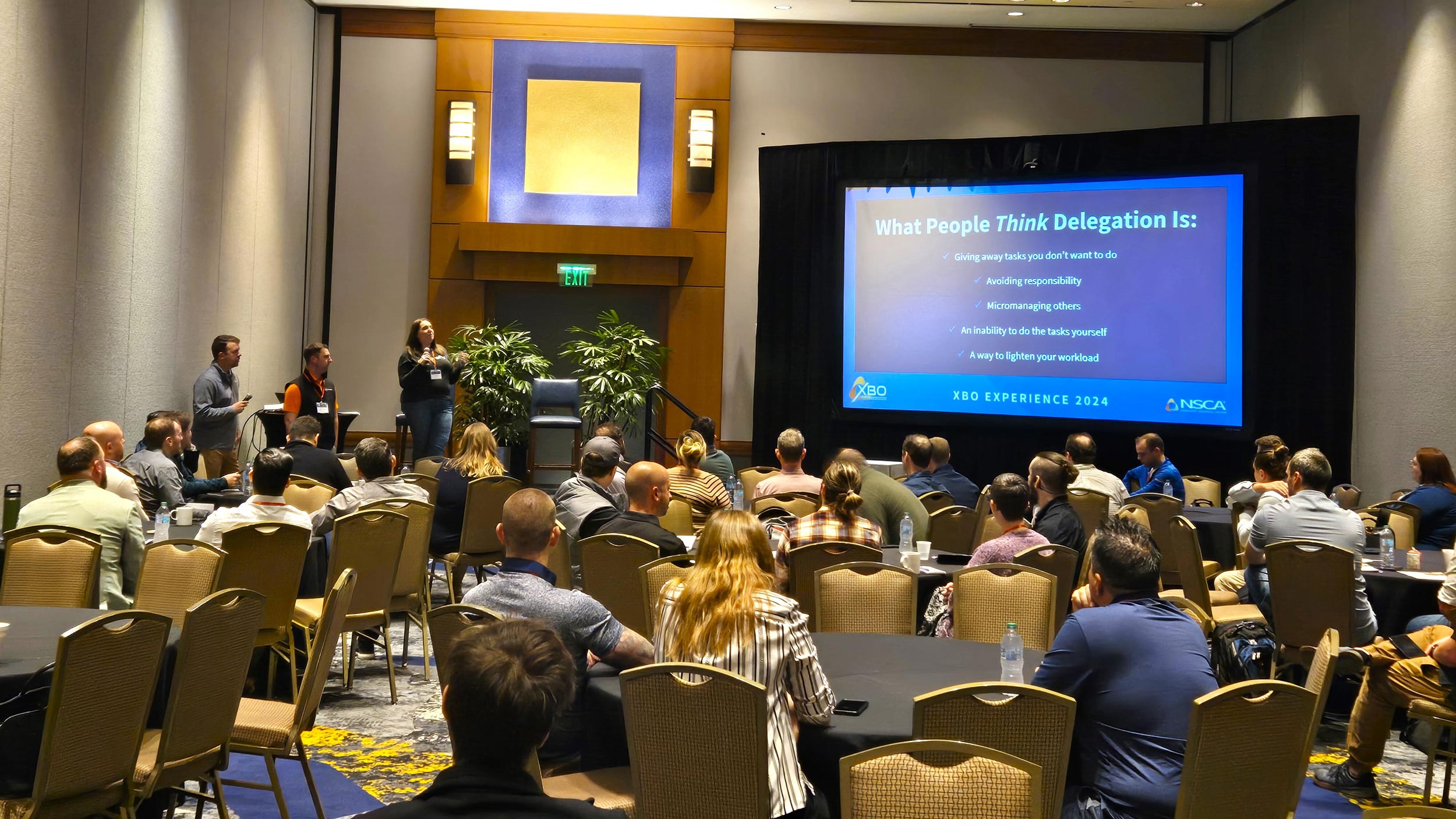 Team members collaborating in a modern meeting room setting